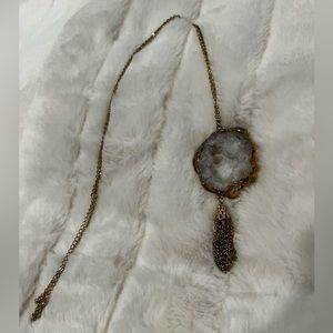 Long geode pendant necklace on gold chain